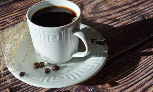 Drip coffee in mug on saucer